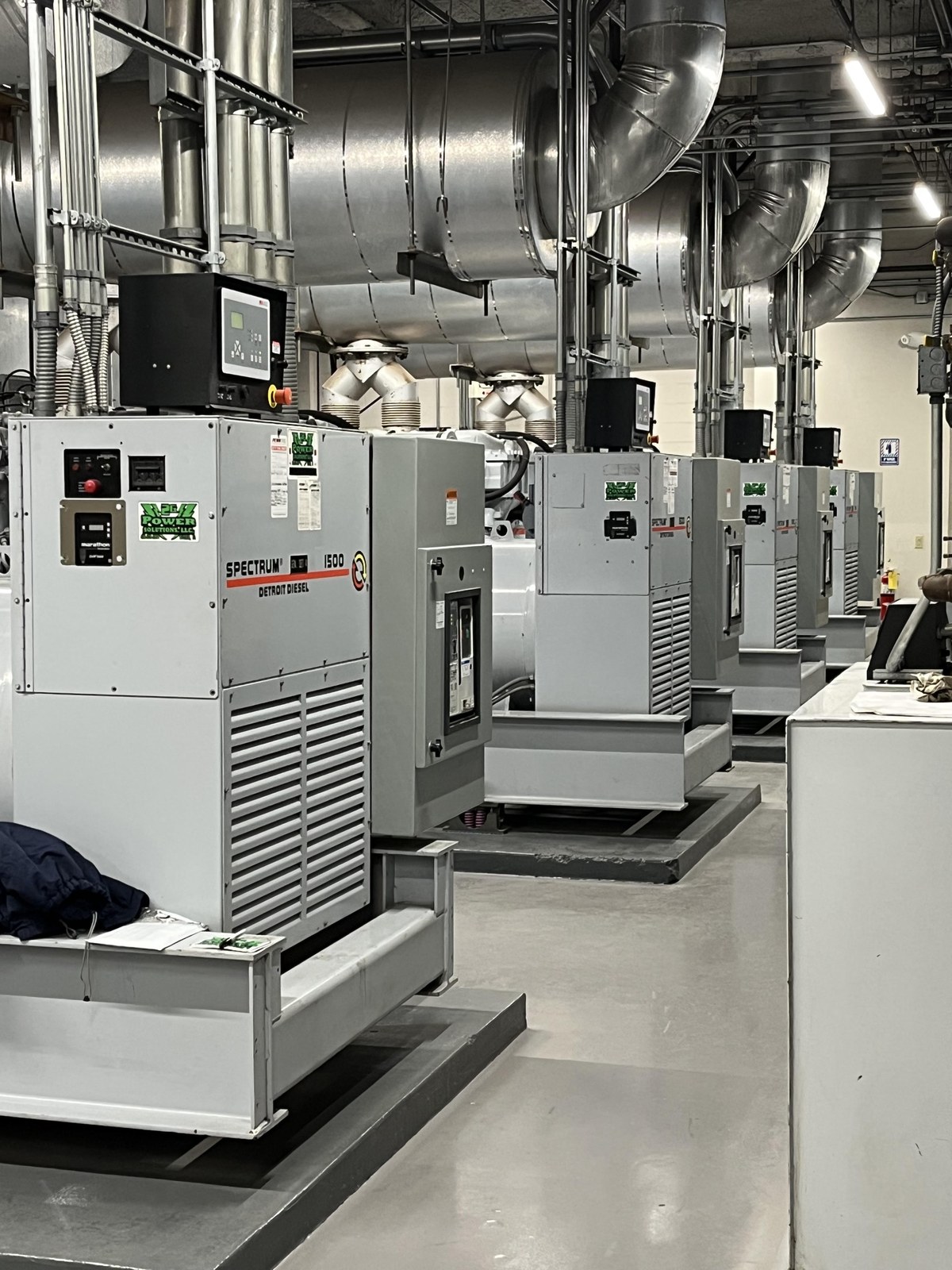 A room of commercial standby generators ready for 24/7 emergency power response by 2G Power Solutions across Western Pennsylvania