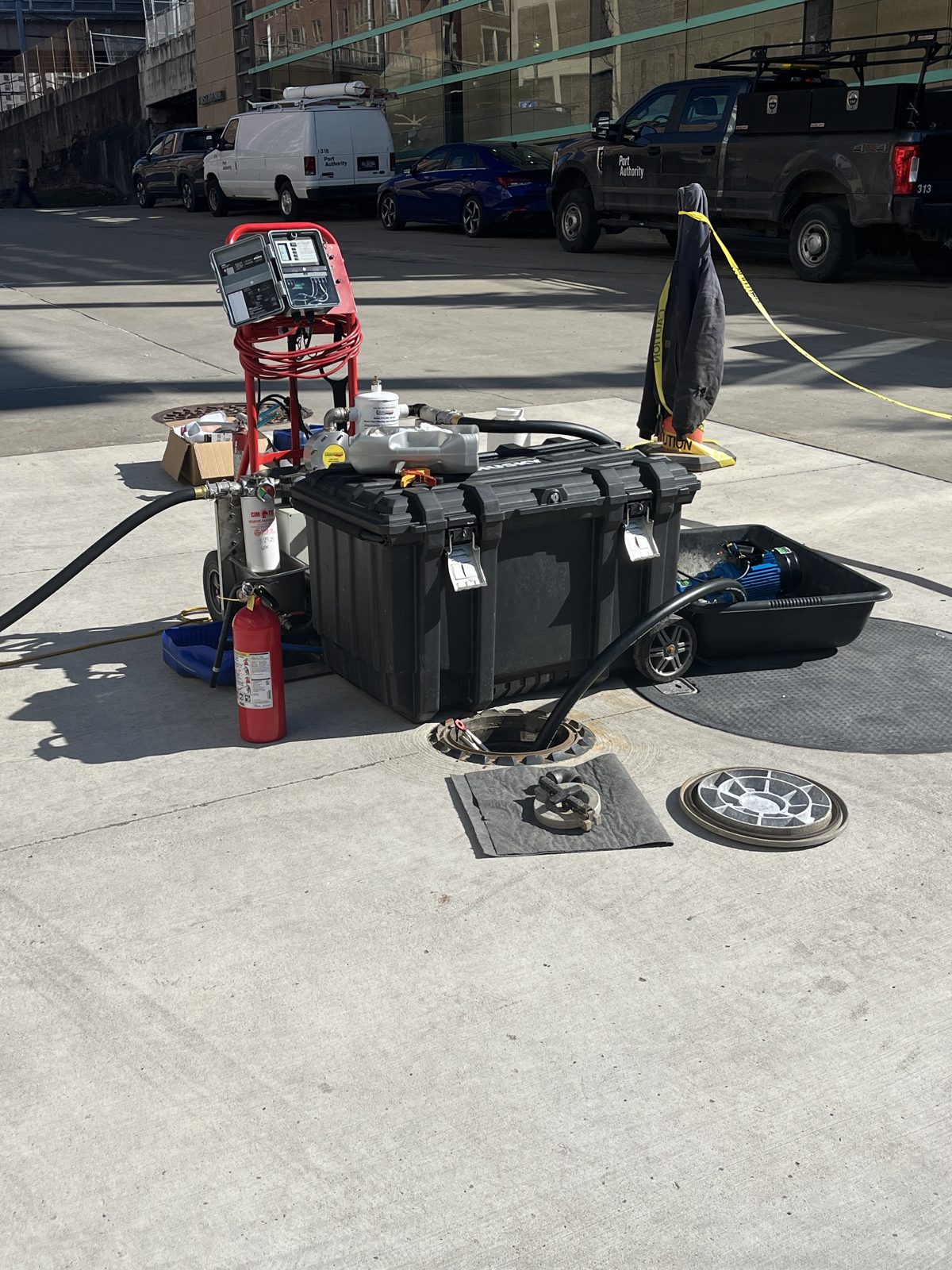 A 2G Power Solutions fuel-polishing rig on site — filtration and pumps with hoses running into a generator's fuel tank access