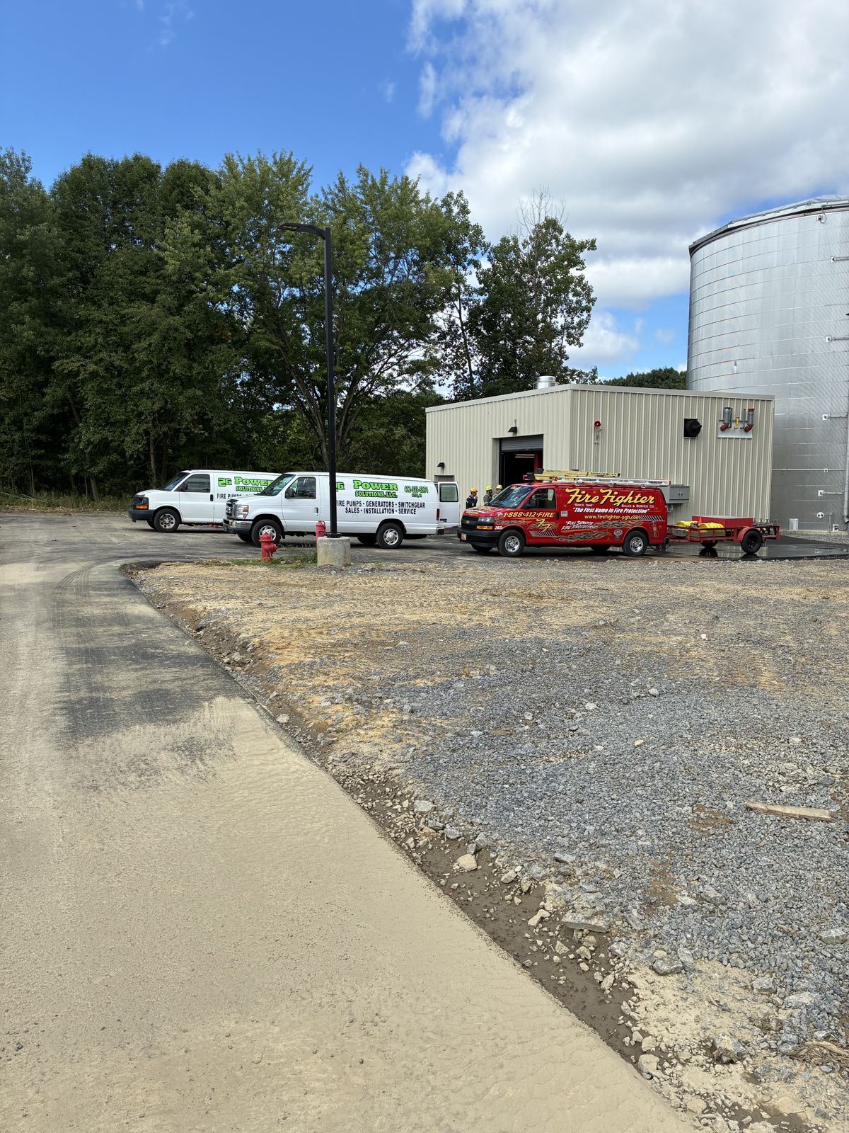 2G Power Solutions service vans and technicians at a job site in Western Pennsylvania